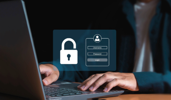 Laptop with image hovering over keys of a lock and login form, signifying a secure login.